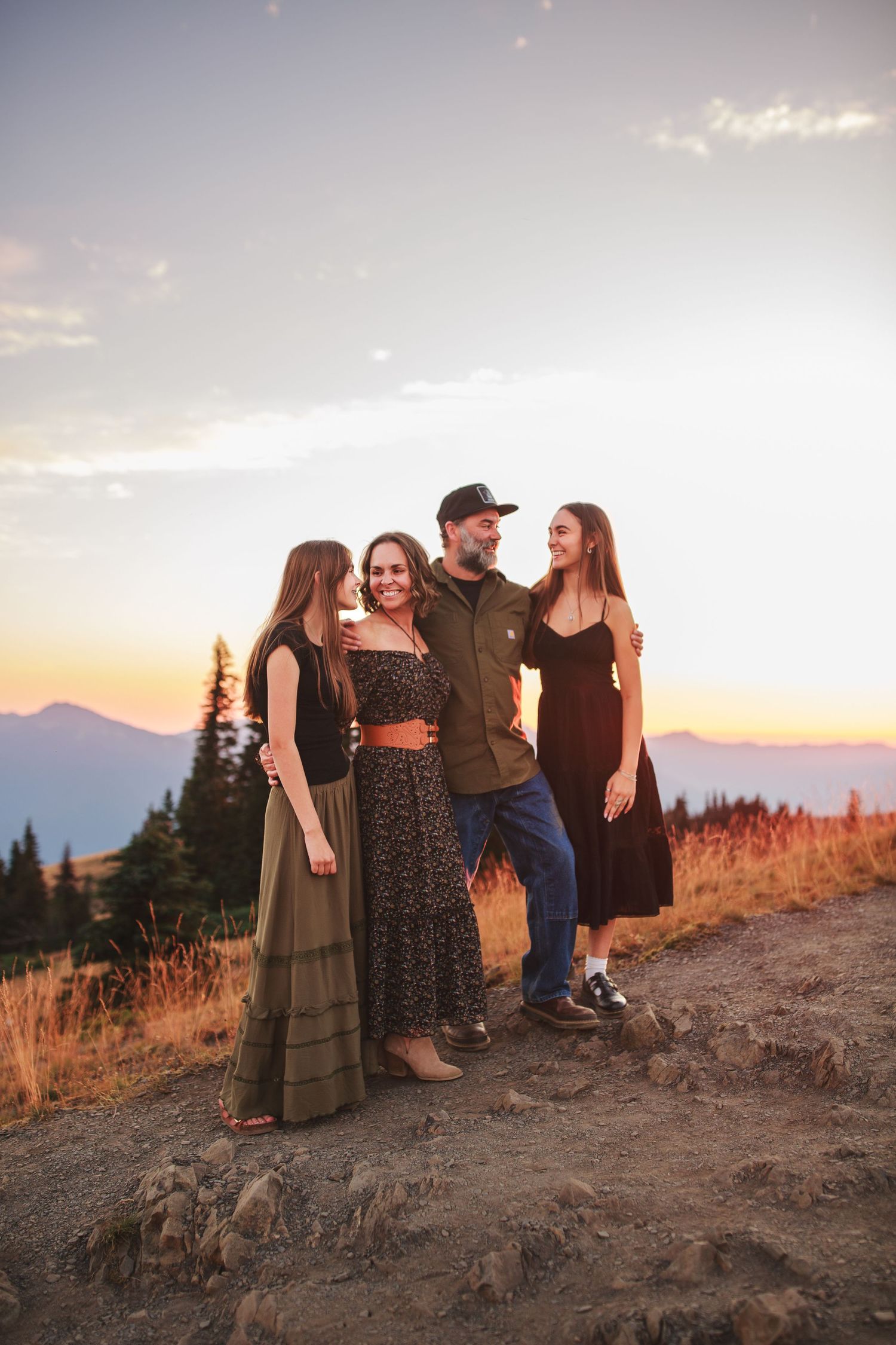 Family standing together during their adventure and family photoshoot at Hurricane Ridge in Olympic National Park near Seattle, Washington