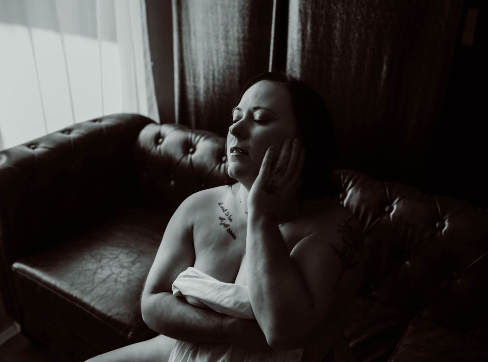 Wisconsin boudoir photography with a woman for a post divorce boudoir photoshoot.