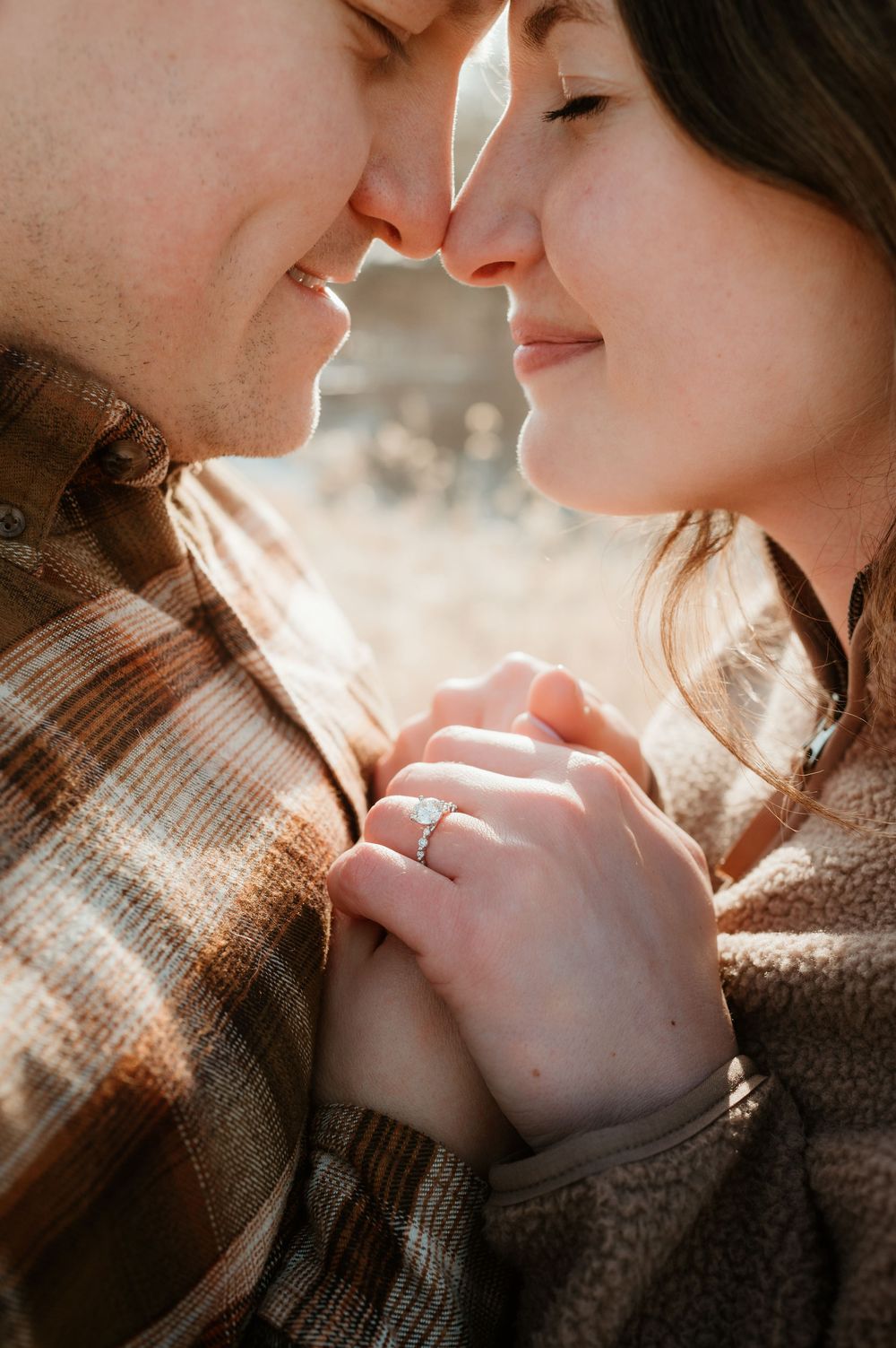 Intimate close-up shots of a couple in warm lighting showing tender romantic moments.