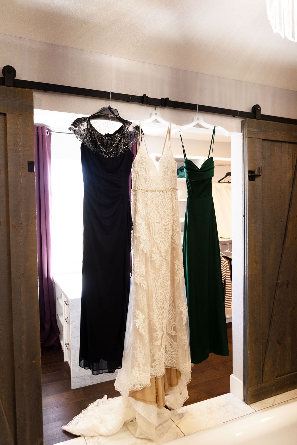 Photos of wedding dress hanging during getting ready photos in Las Vegas