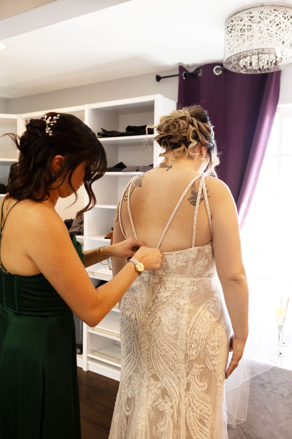Zipping brides dress up during getting ready shot Las Vegas Wedding