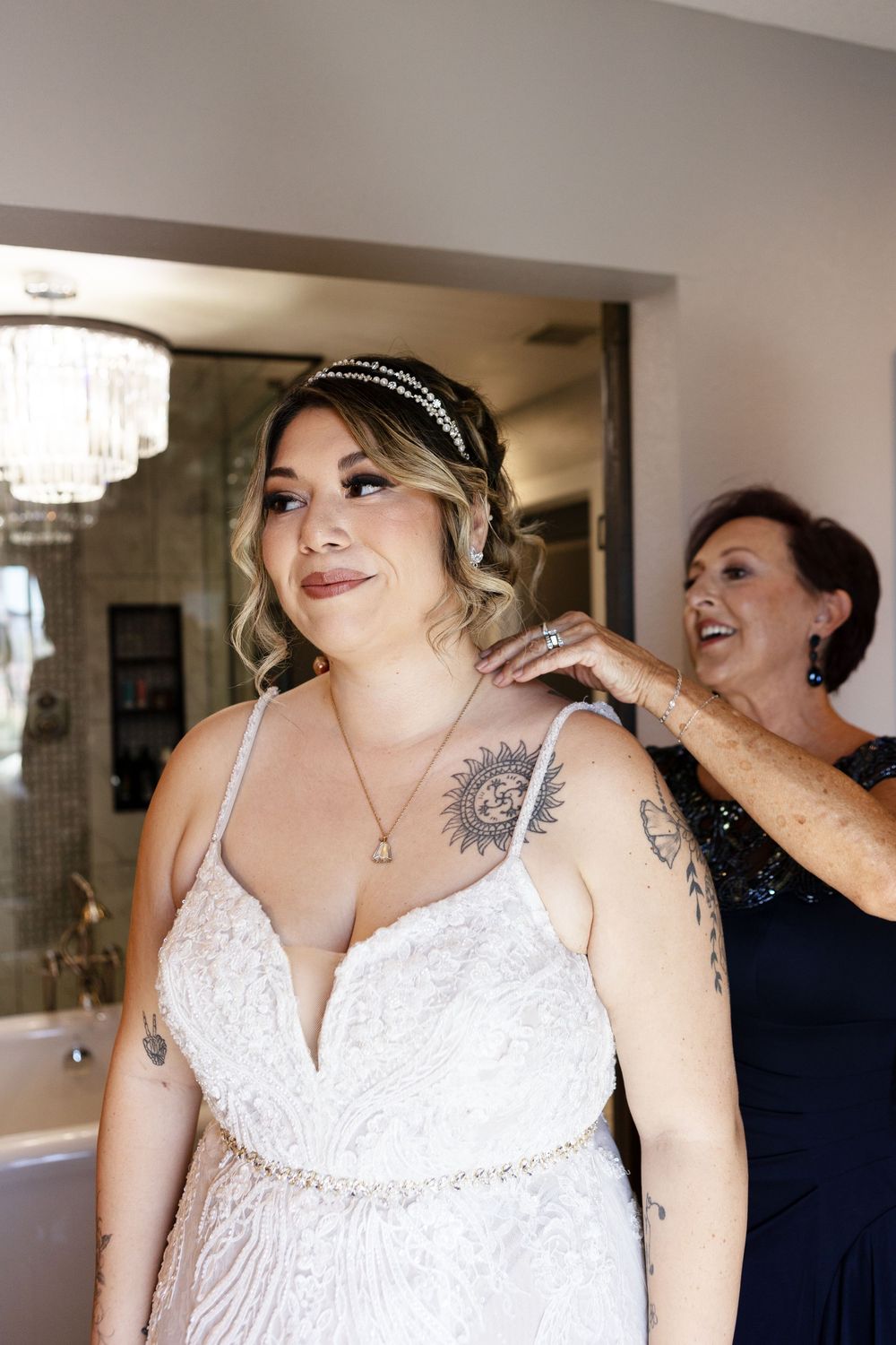 Brides mom helping clasp necklace during getting ready for Las Vegas Wedding details