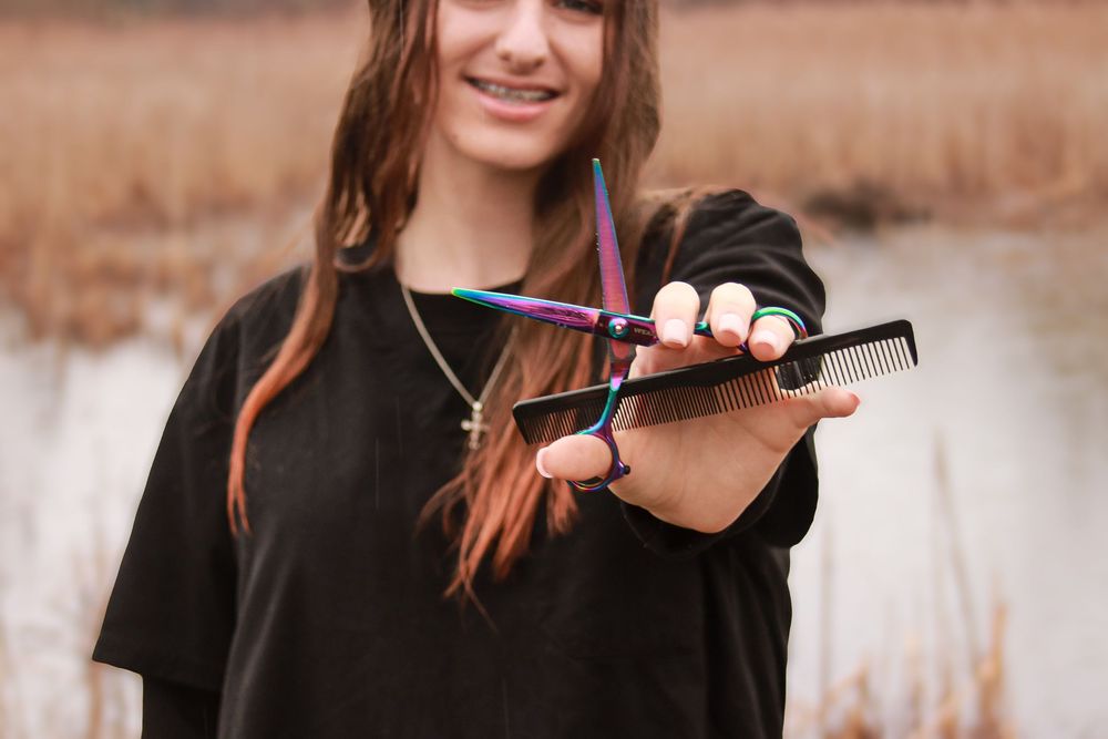 Creative lifestyle, portrait of a woman holding hairstyling tools, outdoor outdoors, captured, in natural light in Michigan