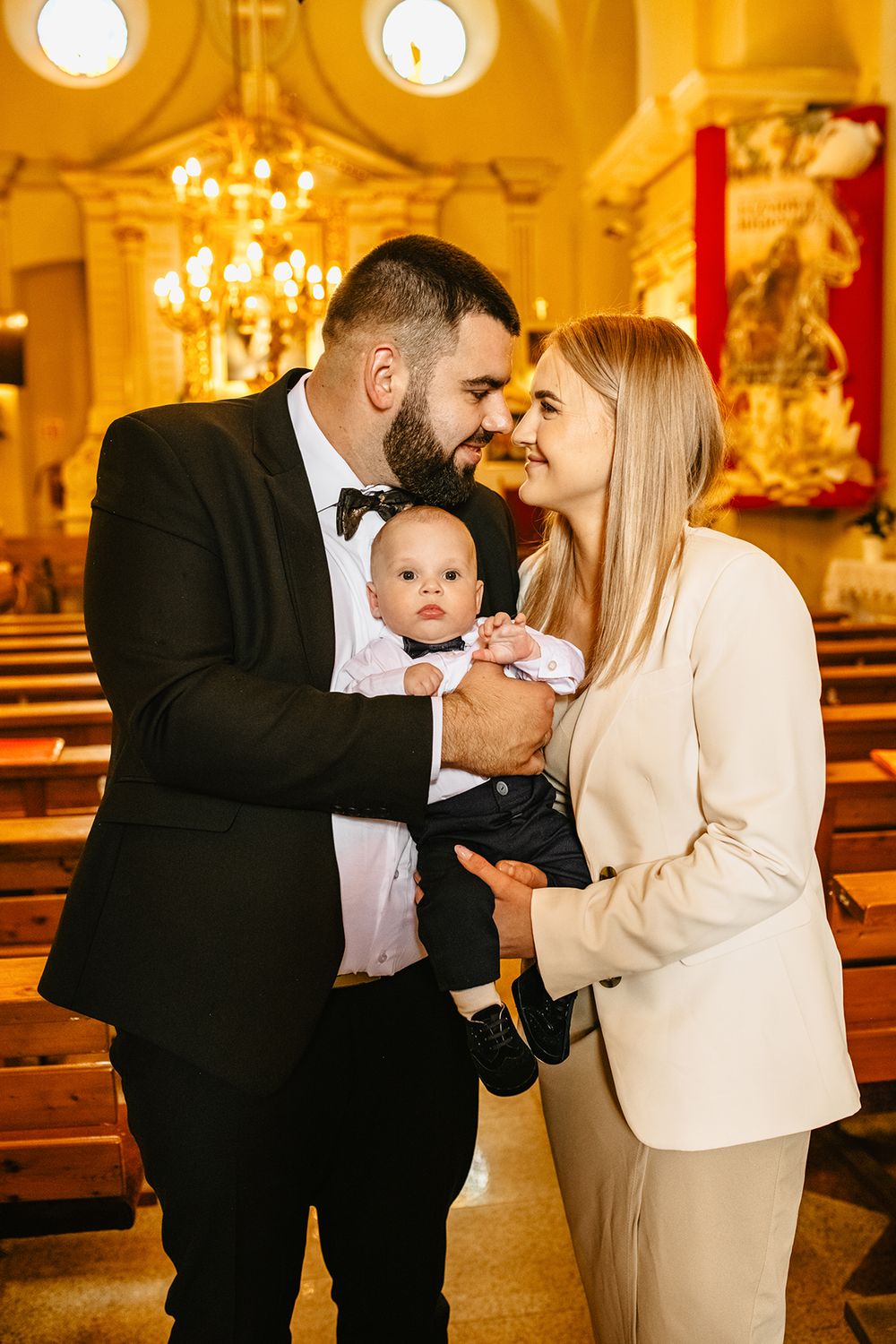 Chrzest dziecka w Kościół Rzymskokatolicki pw. Podwyższenia Krzyża Świętego w Rejowcu Fabrycznym