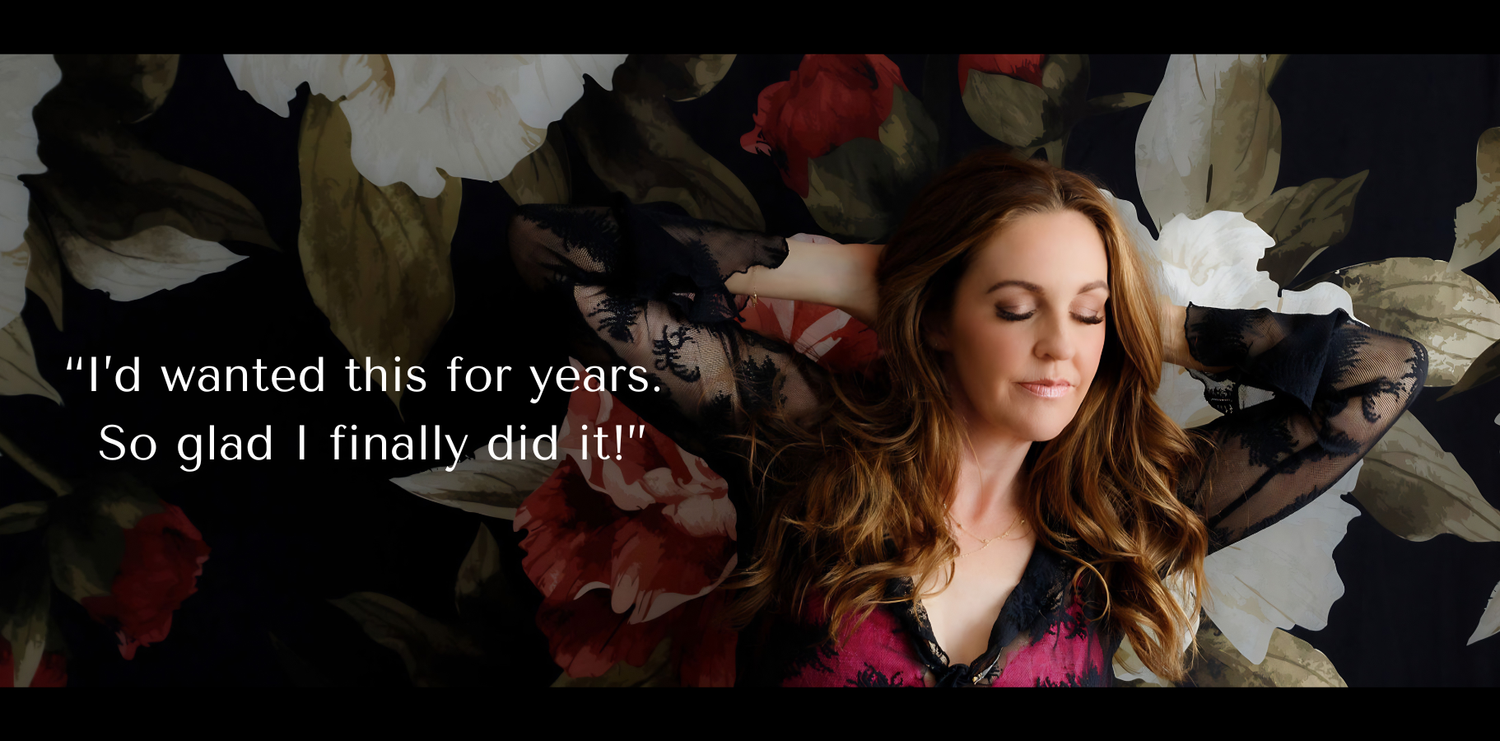 Woman lying among floral fabric with quote about achieving a long-desired goal, elegant lifestyle photography.