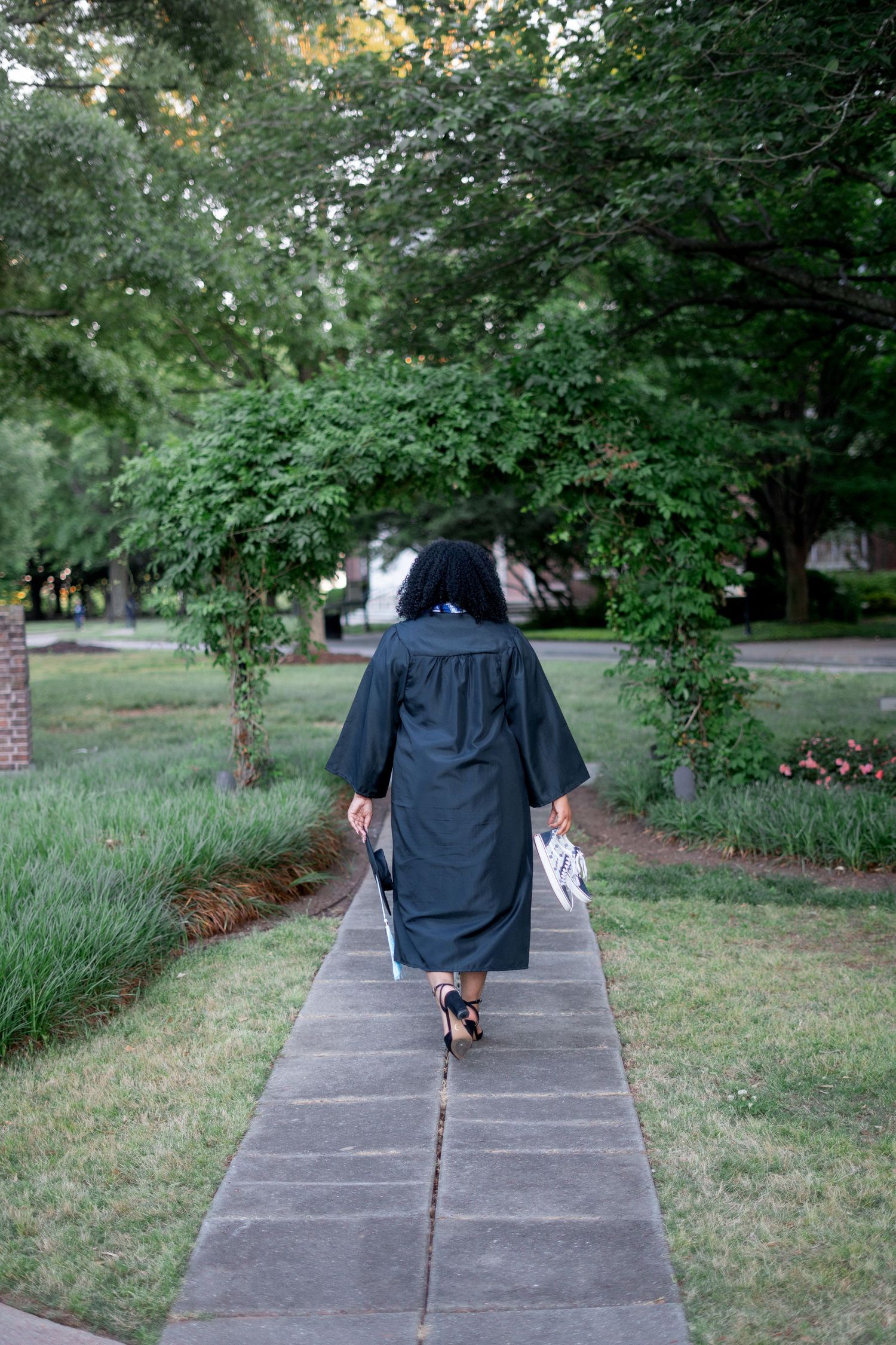 Georgia State graduation photos in front of Spelman Woman Commencement Arch, one of the best spots on the Atlanta campus