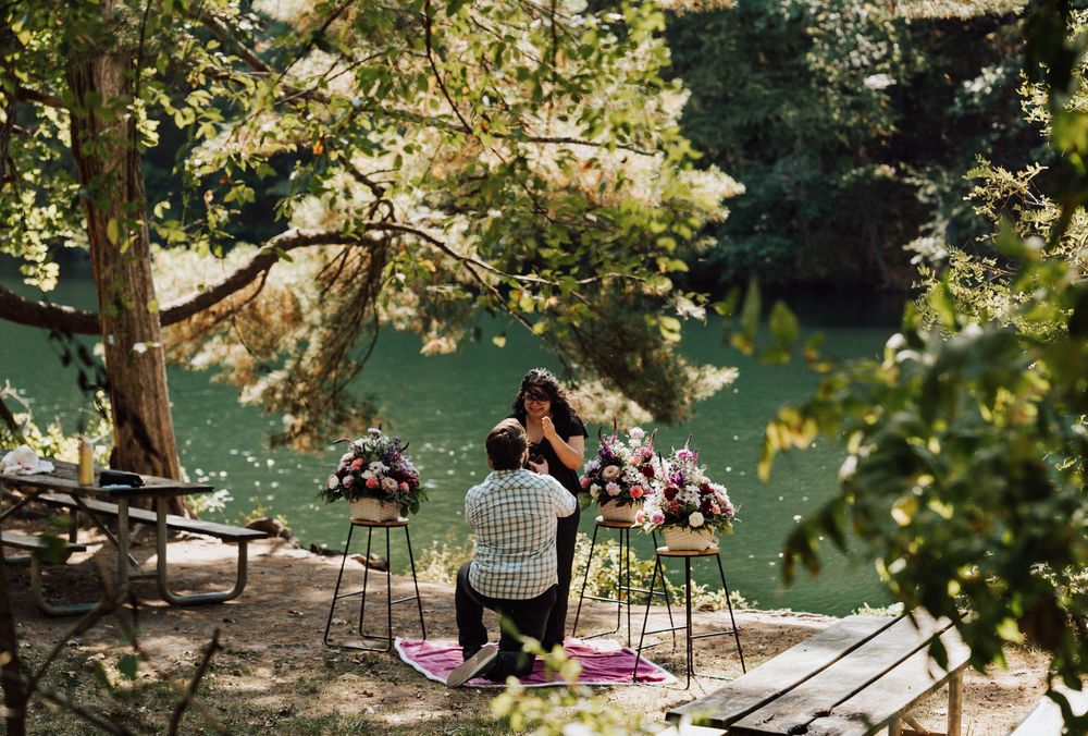 Woman getting proposed by a man at fuller lake in central pa