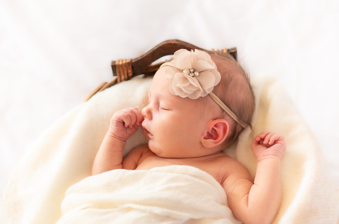 Newborn baby girl in Natural Light Studio by Bartlesville newborn and family photographer Kristi Bray Photography
