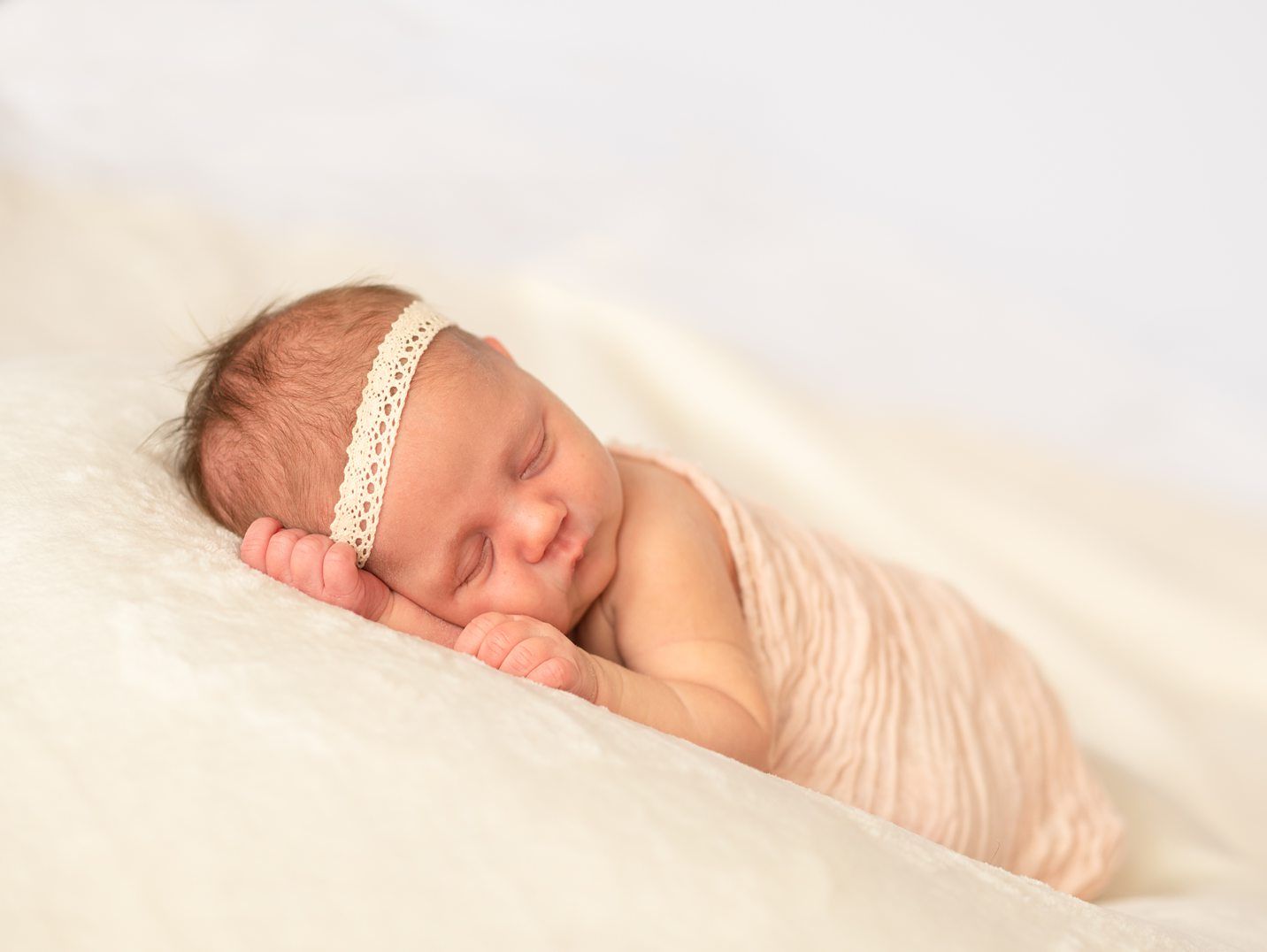 Newborn baby girl in Natural Light Studio by Bartlesville newborn and family photographer Kristi Bray Photography