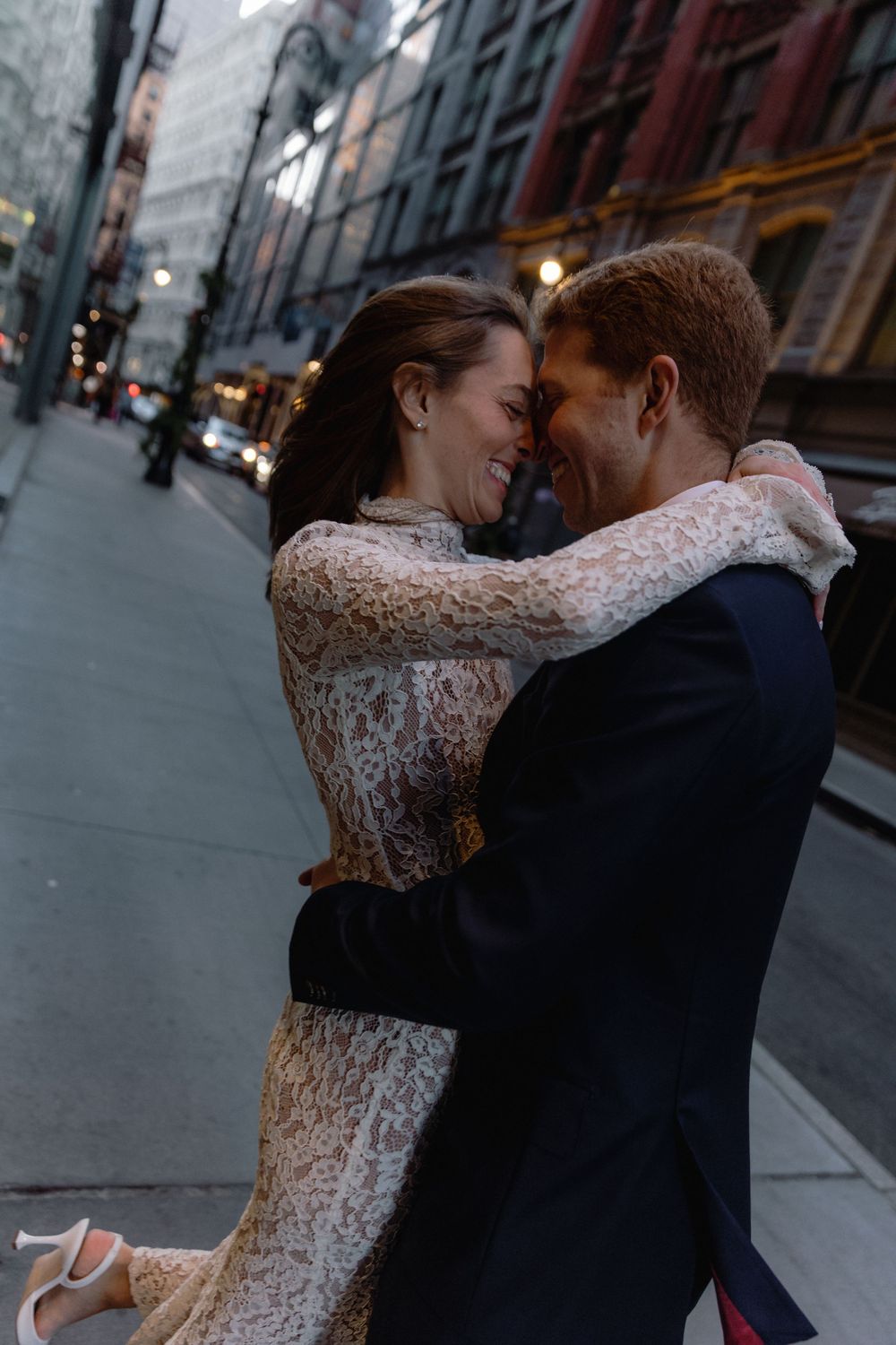 A sequence of romantic street photos showing a couple embracing in an urban setting at dusk.