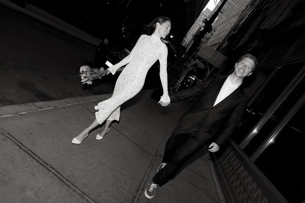 A black and white photo sequence shows a person falling down a flight of stairs in dramatic motion.