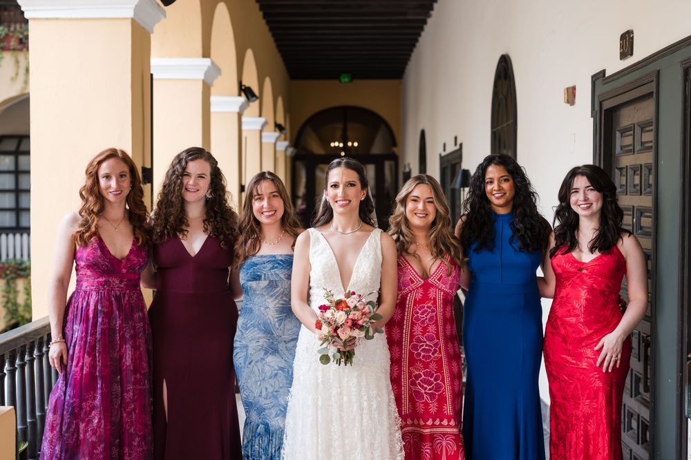 Bride and bridesmaids posing together at Hotel El Convento in Old San Juan Puerto Rico