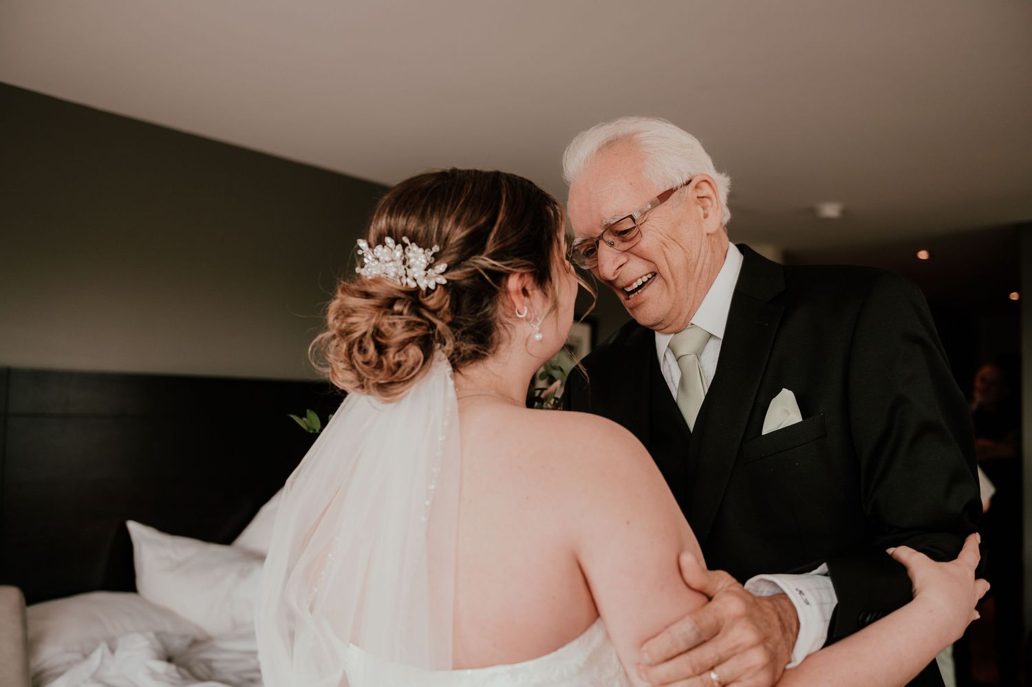A sequence of wedding photos showing intimate moments between couples and family members during a celebration.