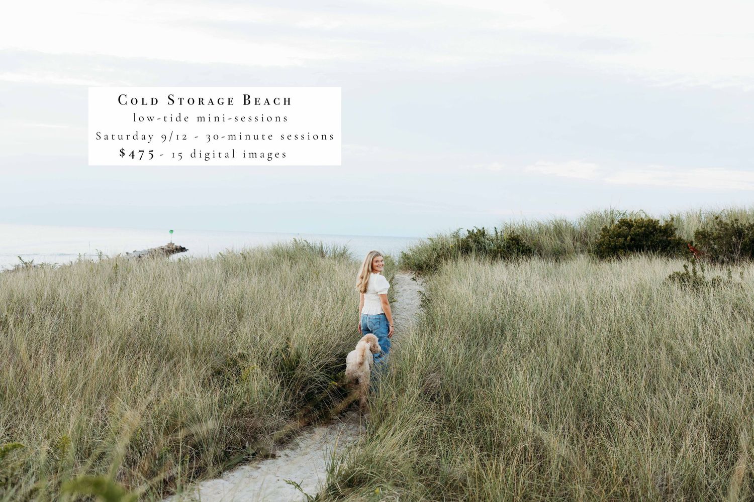 People walk along a grassy coastal path through sand dunes on a cloudy summer day.