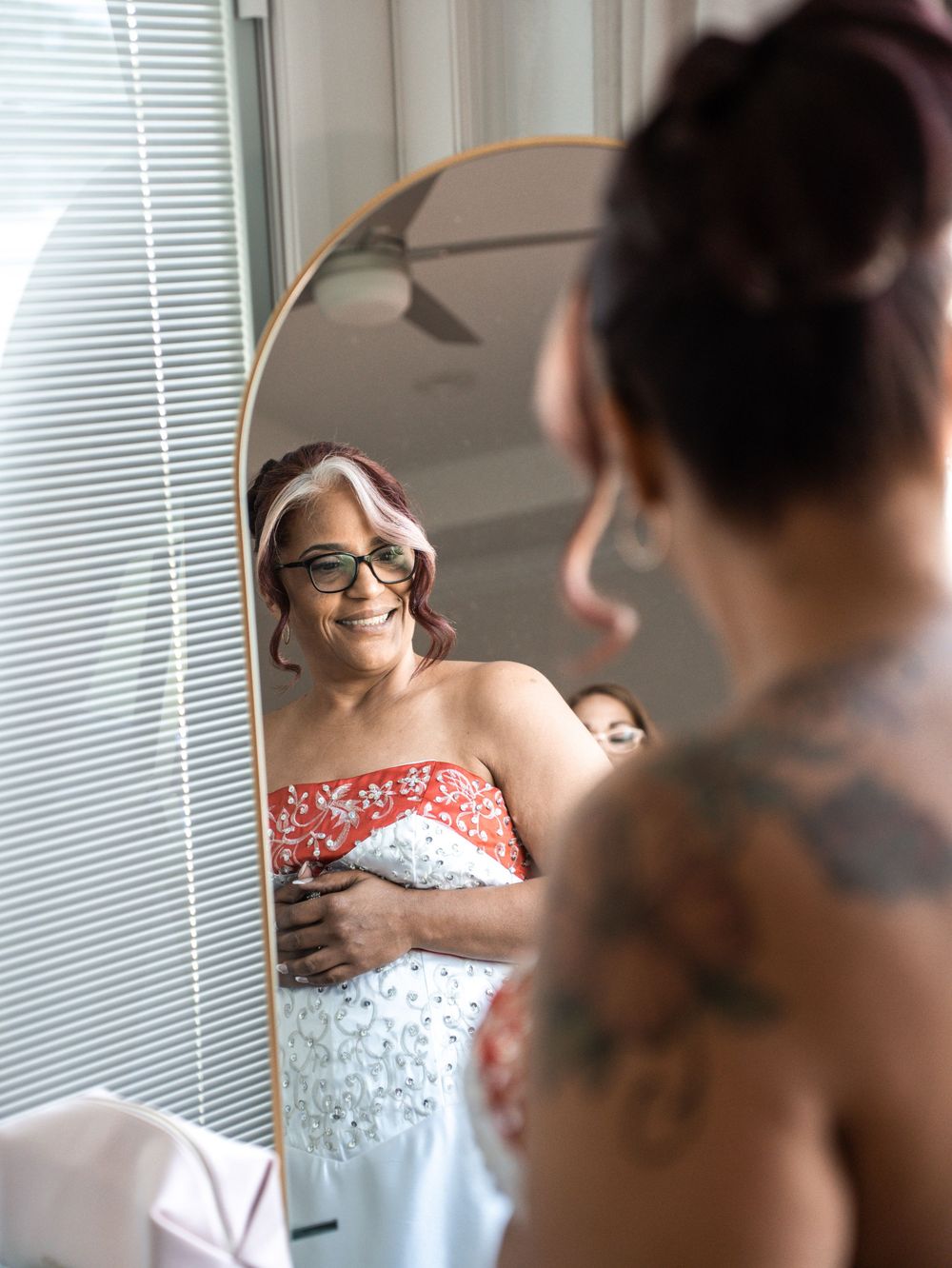 A series of candid getting-ready moments showing preparations in a room with window blinds in the background.
