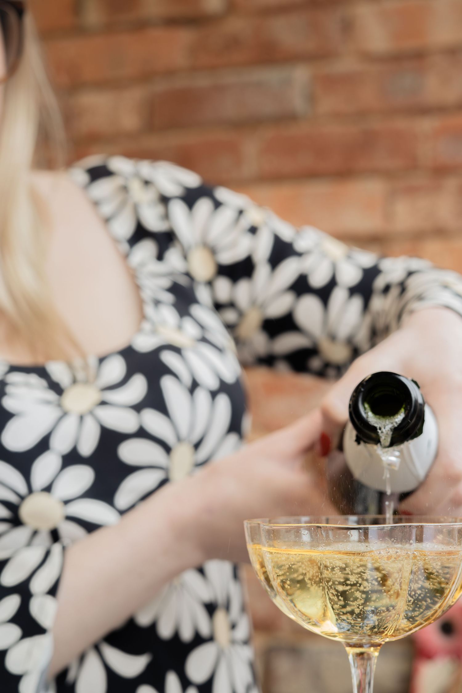 Celebrate good times - pouring champagne - photographed by BLOOM Fabulous Photography