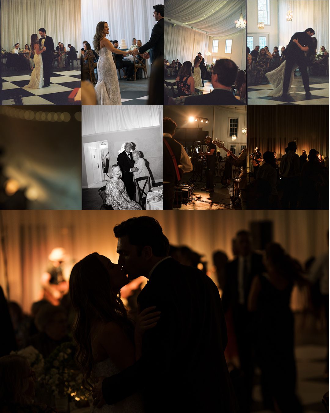 A dimly lit wedding reception venue with silhouettes of people dancing and mingling on the dance floor.