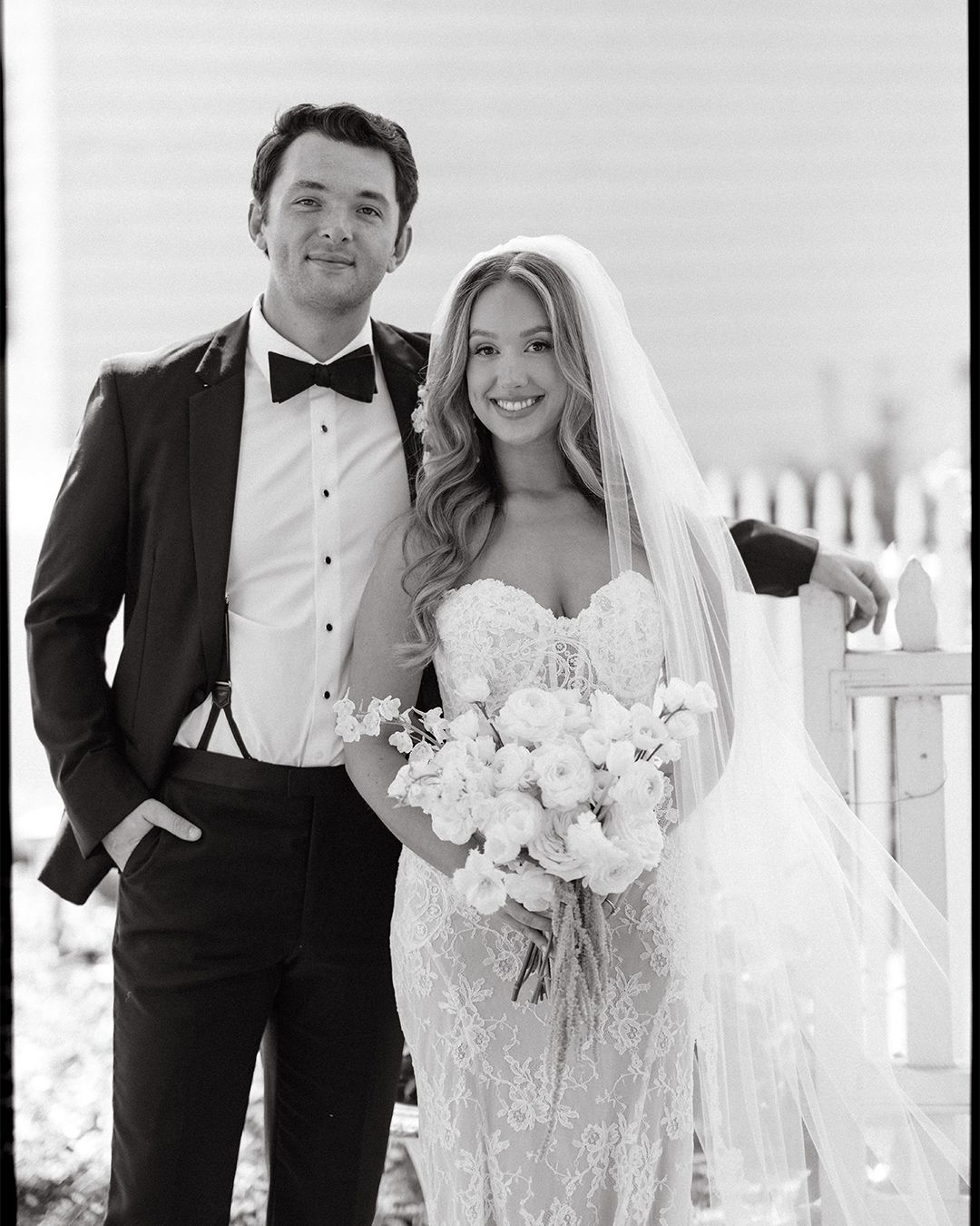 Black and white wedding photo series showing couple with white roses and formal attire.