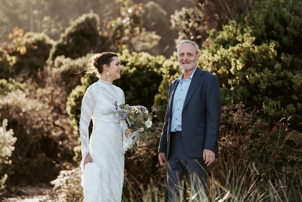 father walking daughter to get married at Tessellated Pavements, by Joss Jensen Photography