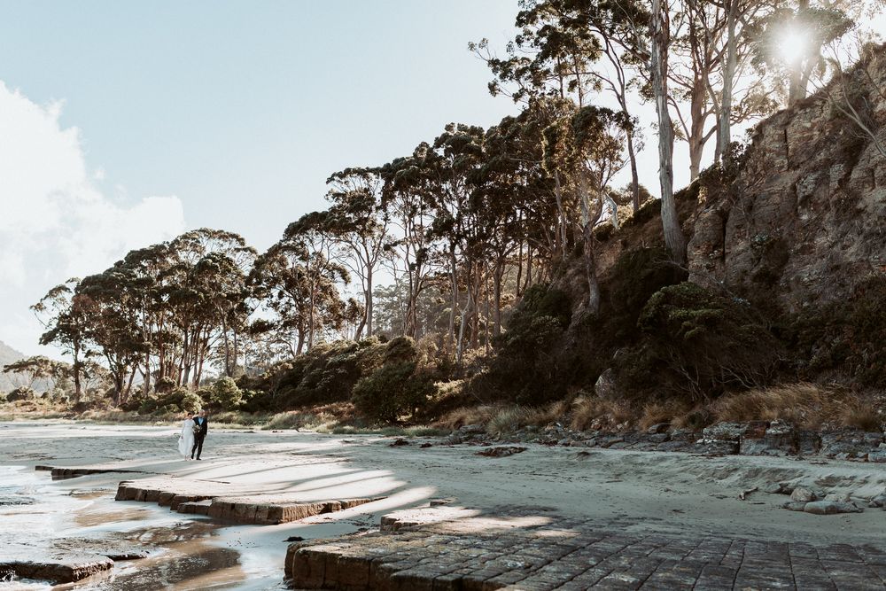 father walking daughter to get married at Tessellated Pavements, by Joss Jensen Photography