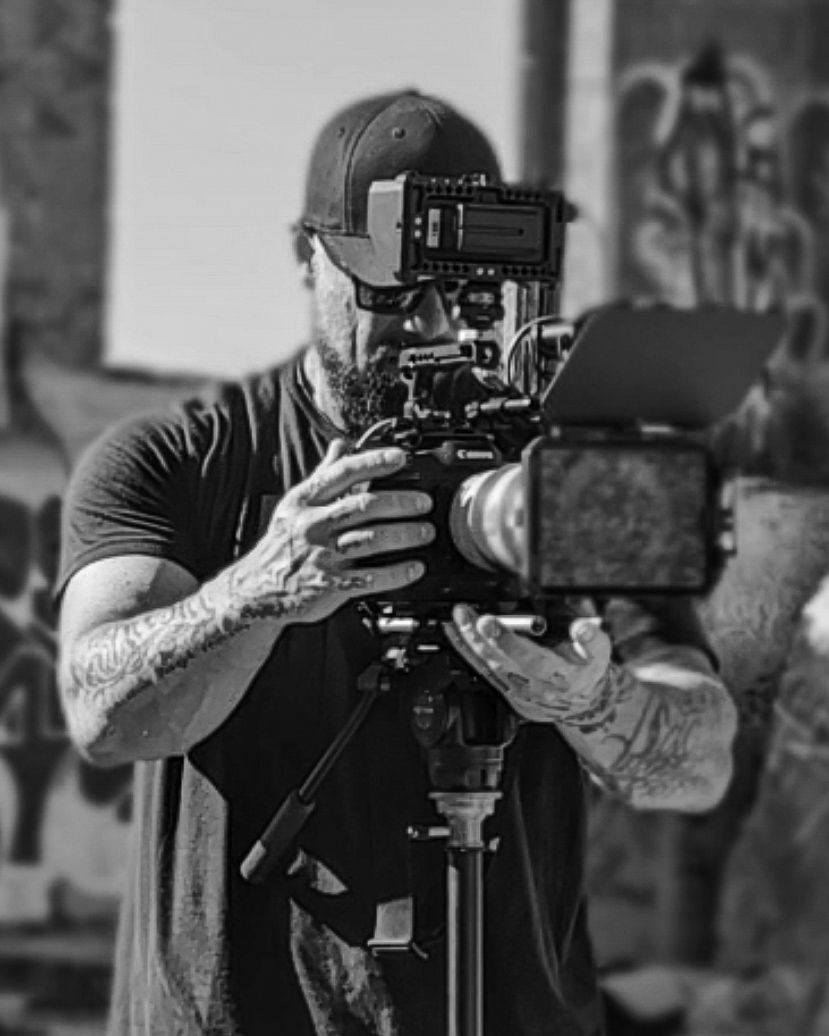 Black and white photo sequence showing a tactical shooter taking aim with a rifle in multiple similar poses.