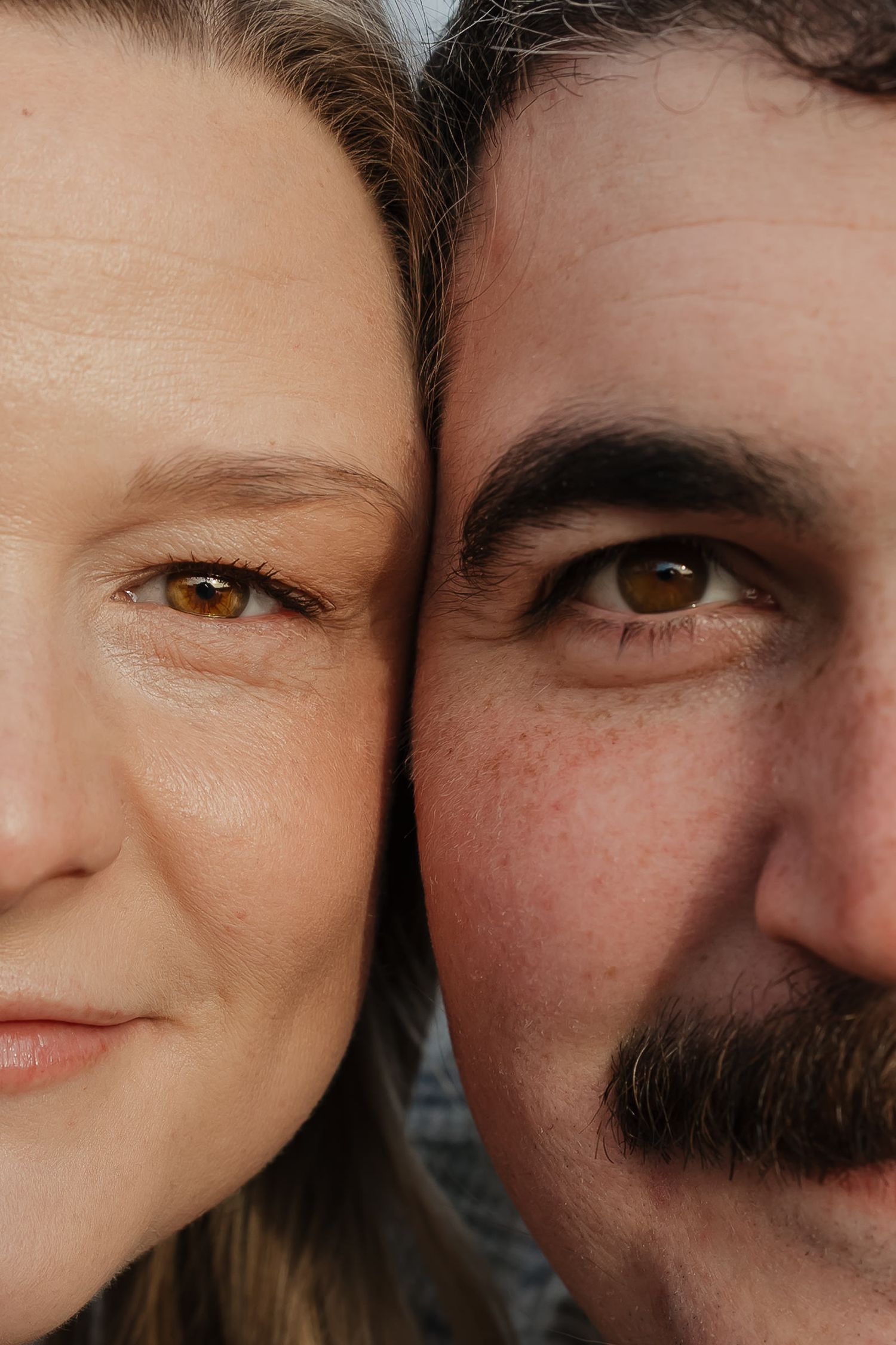 close up photo of just mom and dads brown eyes directly next to each other at lake olathe