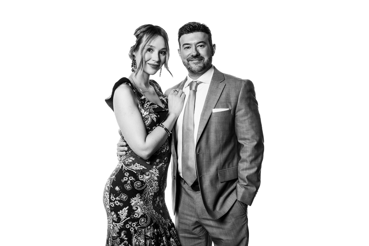 Series of black and white portraits showing wedding couple in formal attire.