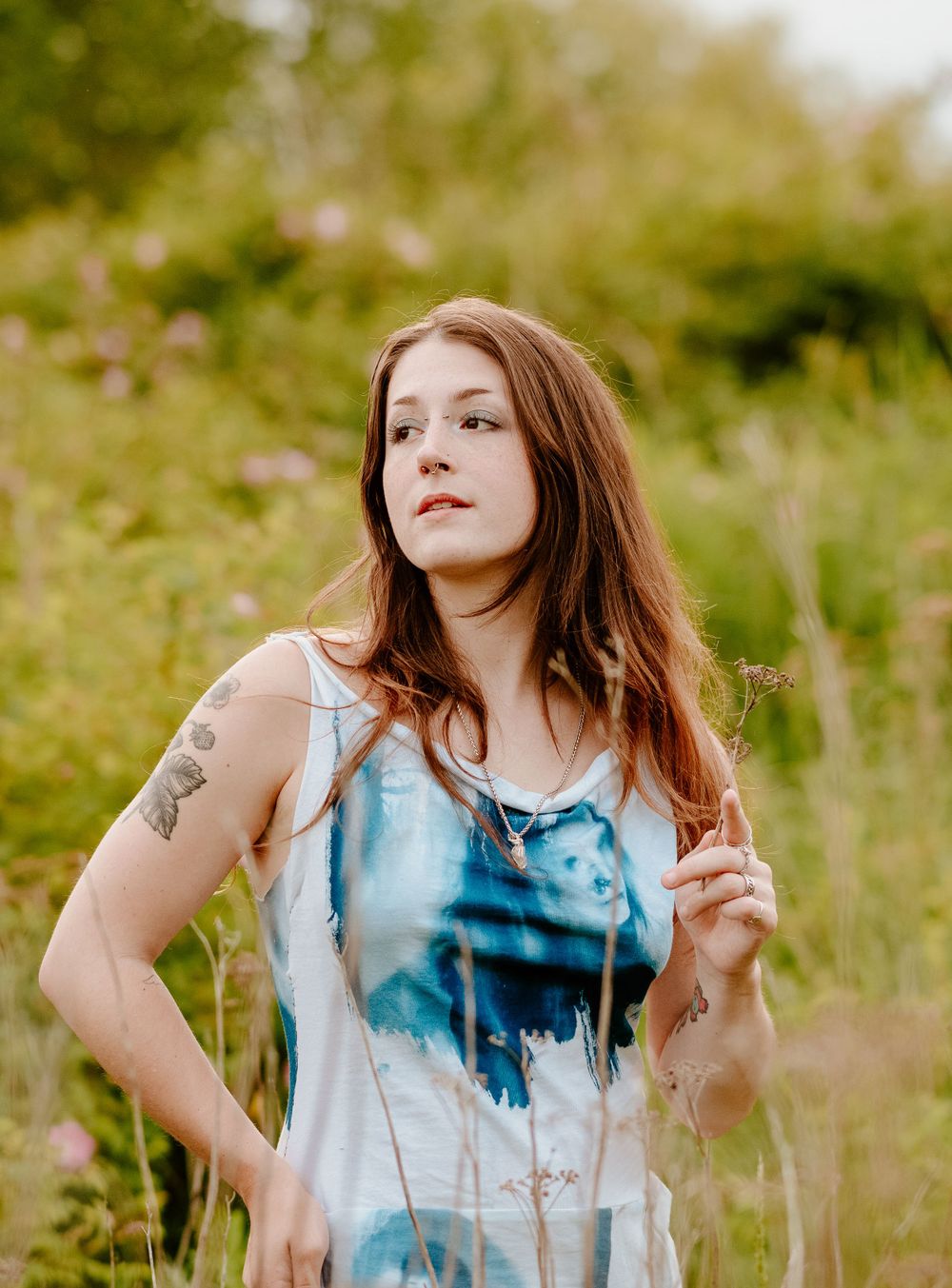 Artistic outdoor photography sequence featuring a tie-dye dress among tall grass.