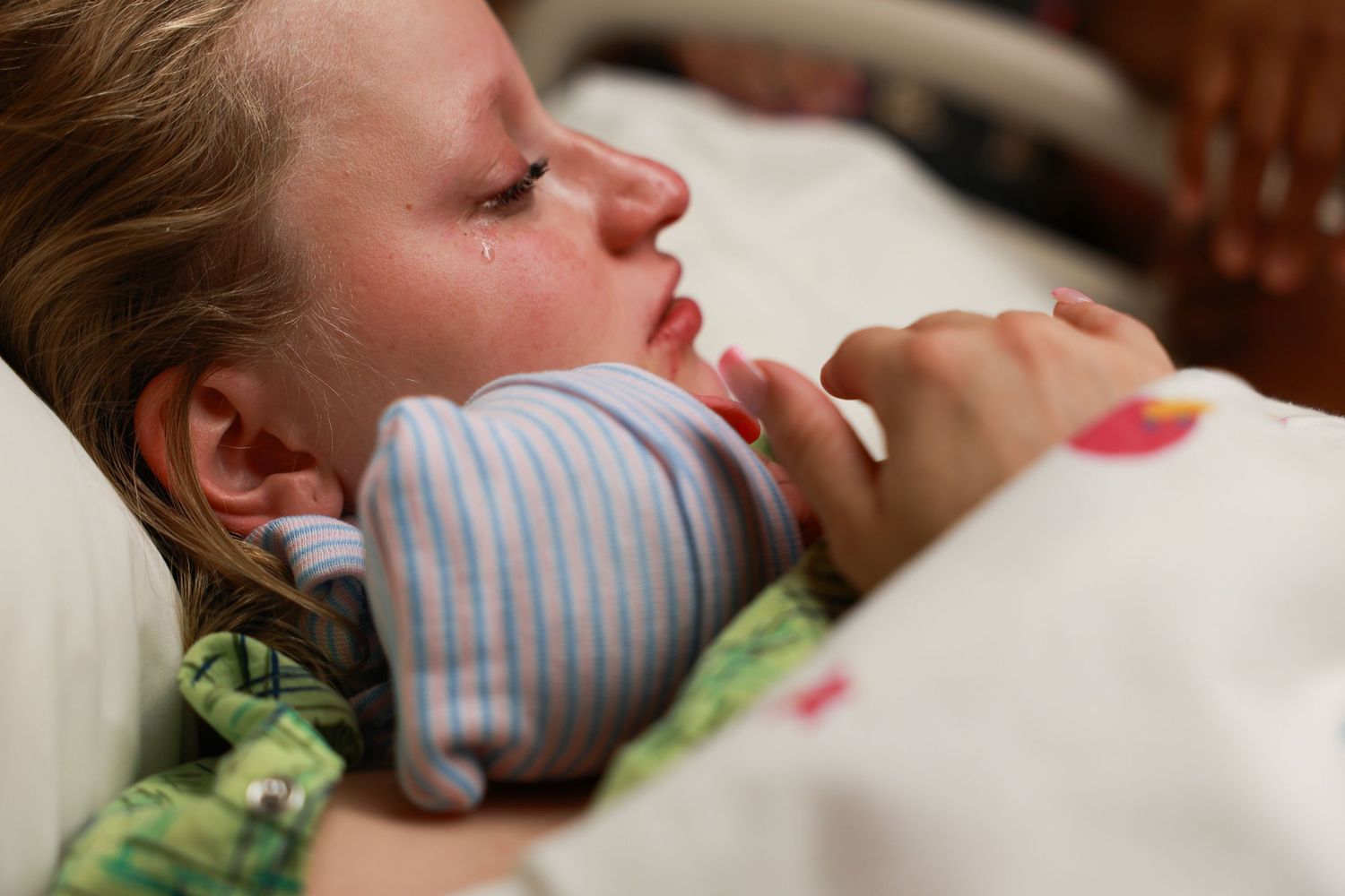 Mom holding baby after birth. Birth photography. Carlsbad NM. Roswell NM. Artesia NM. Newborn and maternity photographer.  baby pictures.