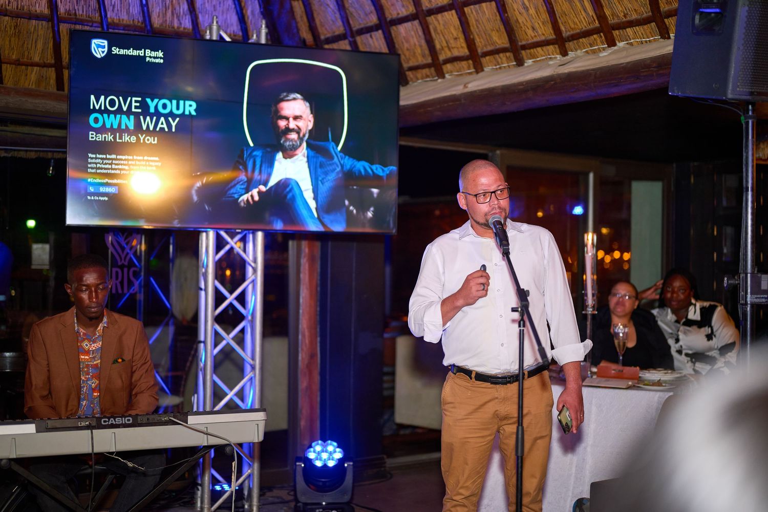 A speaker at a corporate event