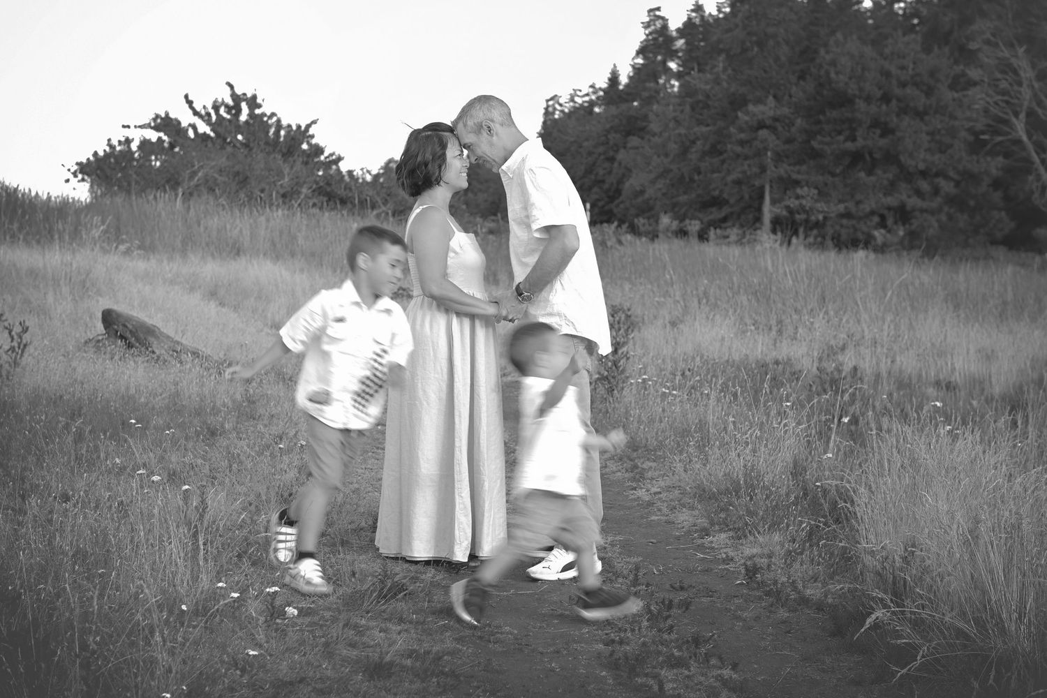 Outdoor family photography session in Vancouver Island, capturing laughter and connection.