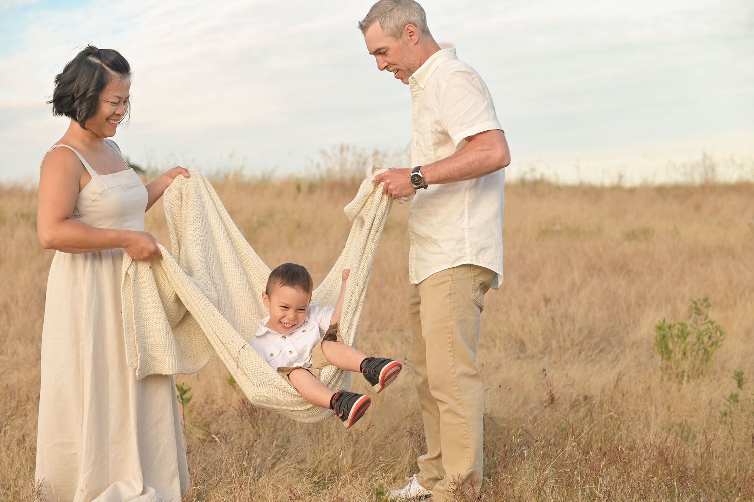 Outdoor family photography session in Nanaimo, capturing laughter and connection.