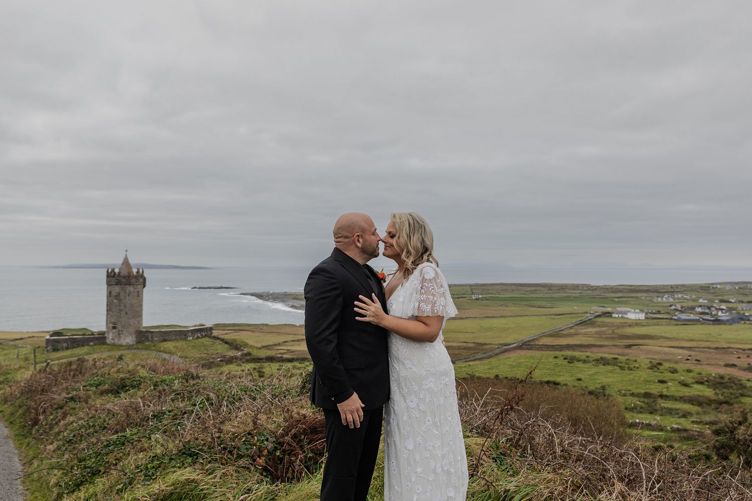 Romantic Ireland elopement portraits near historic Irish castle.