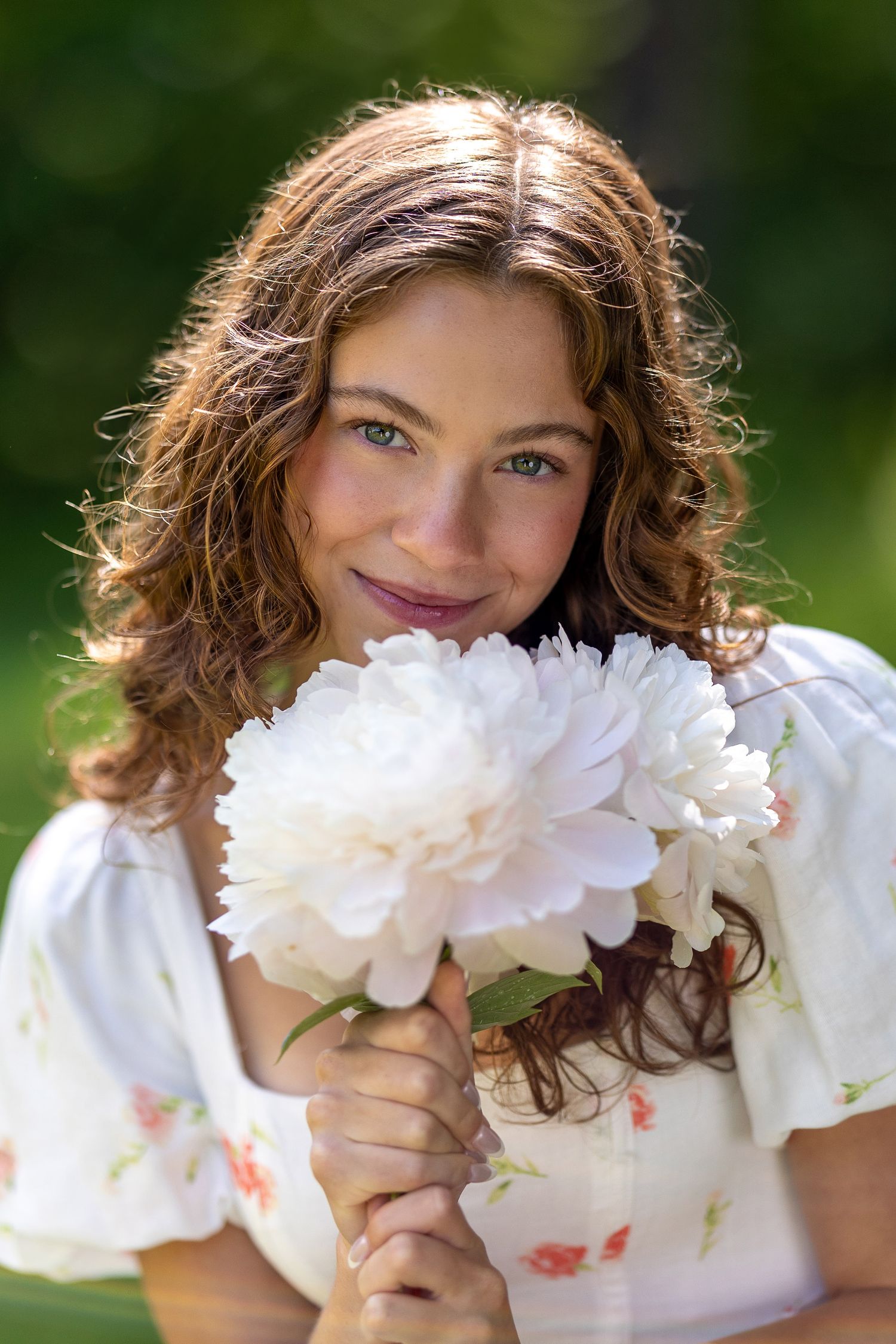High School Senior Portrait with flowers, natural background, Exeter, New Hampshire