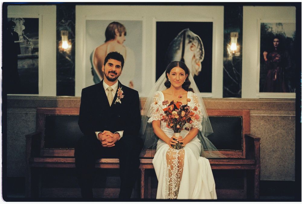 A wedding couple poses in a series of candid moments during their ceremony and reception.
