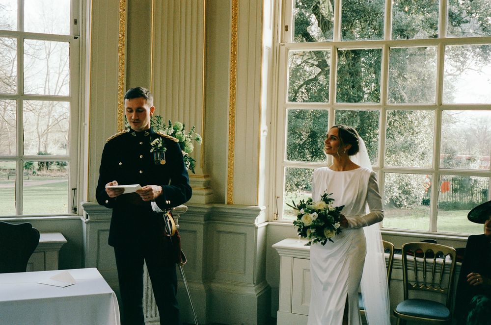 A series of elegant wedding photos showing moments in a bright sunlit room with white decor and floral arrangements.
