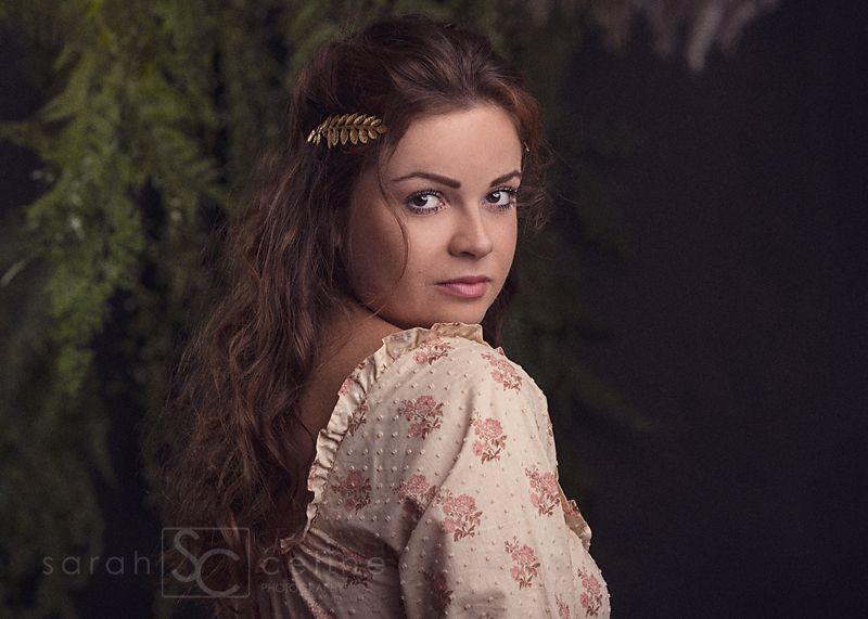 A portrait series showing six poses of a woman in a floral dress against a dark background.