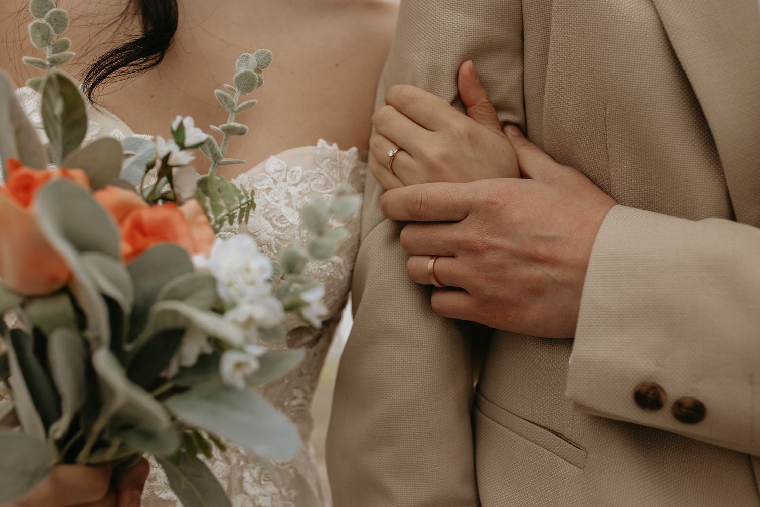 A wedding detail collage showing hands holding bouquets, rings, and floral arrangements in soft beige and coral tones.