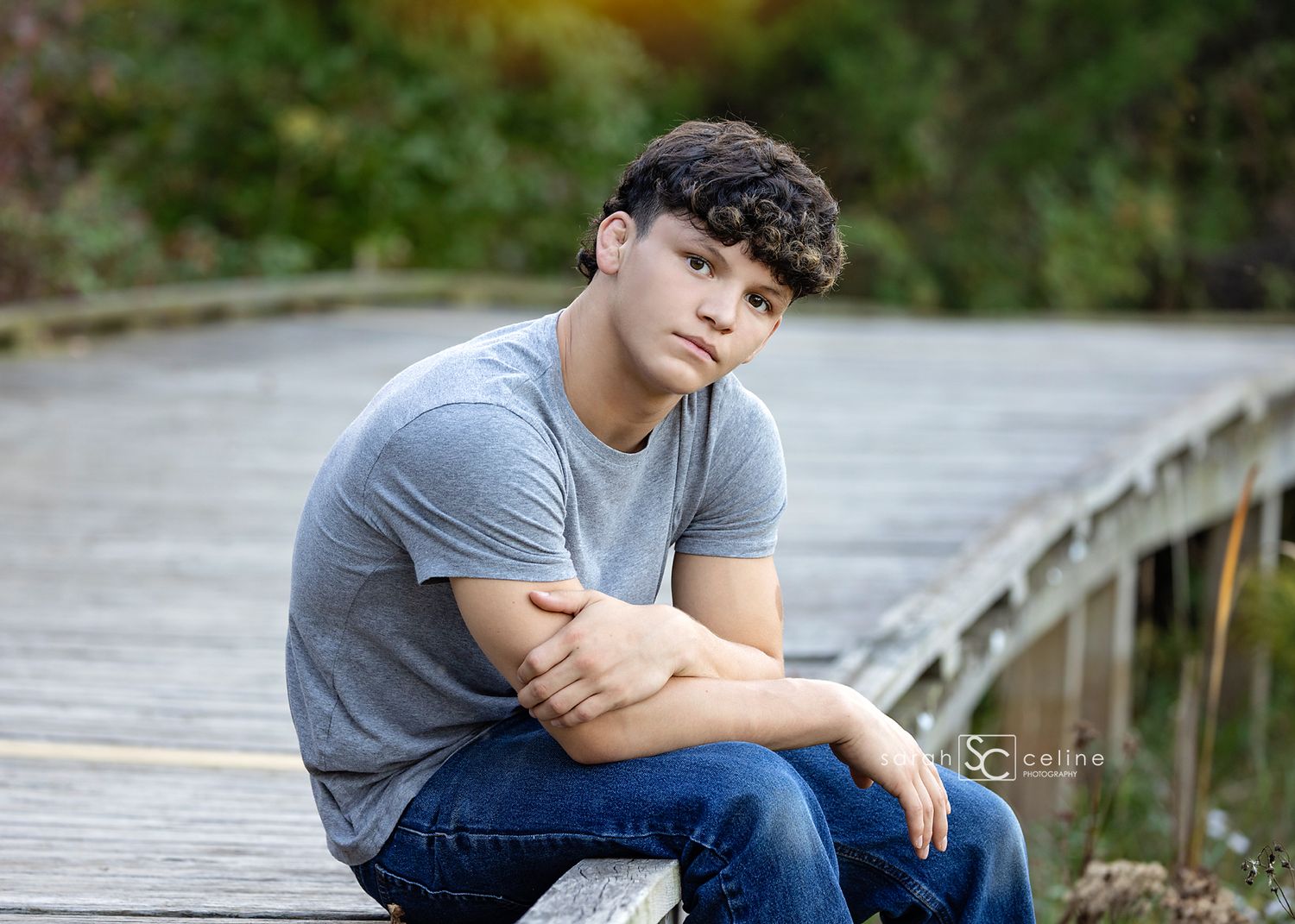 A series of six casual outdoor portrait photos taken on a wooden bridge or walkway.