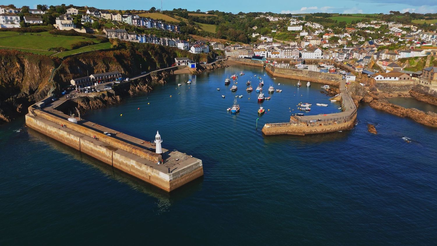mevagissey lighthouse from aerial drone