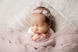 Newborn girl with pink floral headband - Springfield, MO.