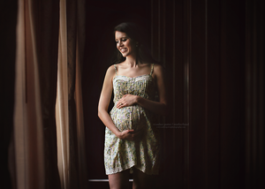 Pregnant mother in dramatic indoor light - Springfield, MO.