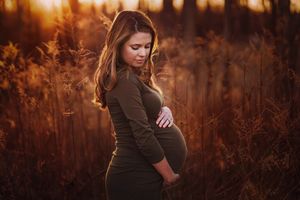 Fall maternity session in open field – Amber Potter Photography Springfield MO.