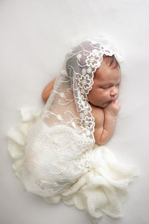 Newborn portrait in white light with cream tones - Springfield, MO.