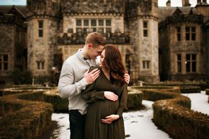Couple maternity photo in front of castle - Springfield MO.