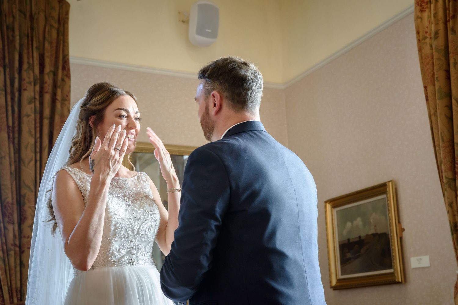 Emotional wedding photograph of a joyful bride and groom at Runcorn Town Hall by Cheshire wedding photographer Michael Pardoe