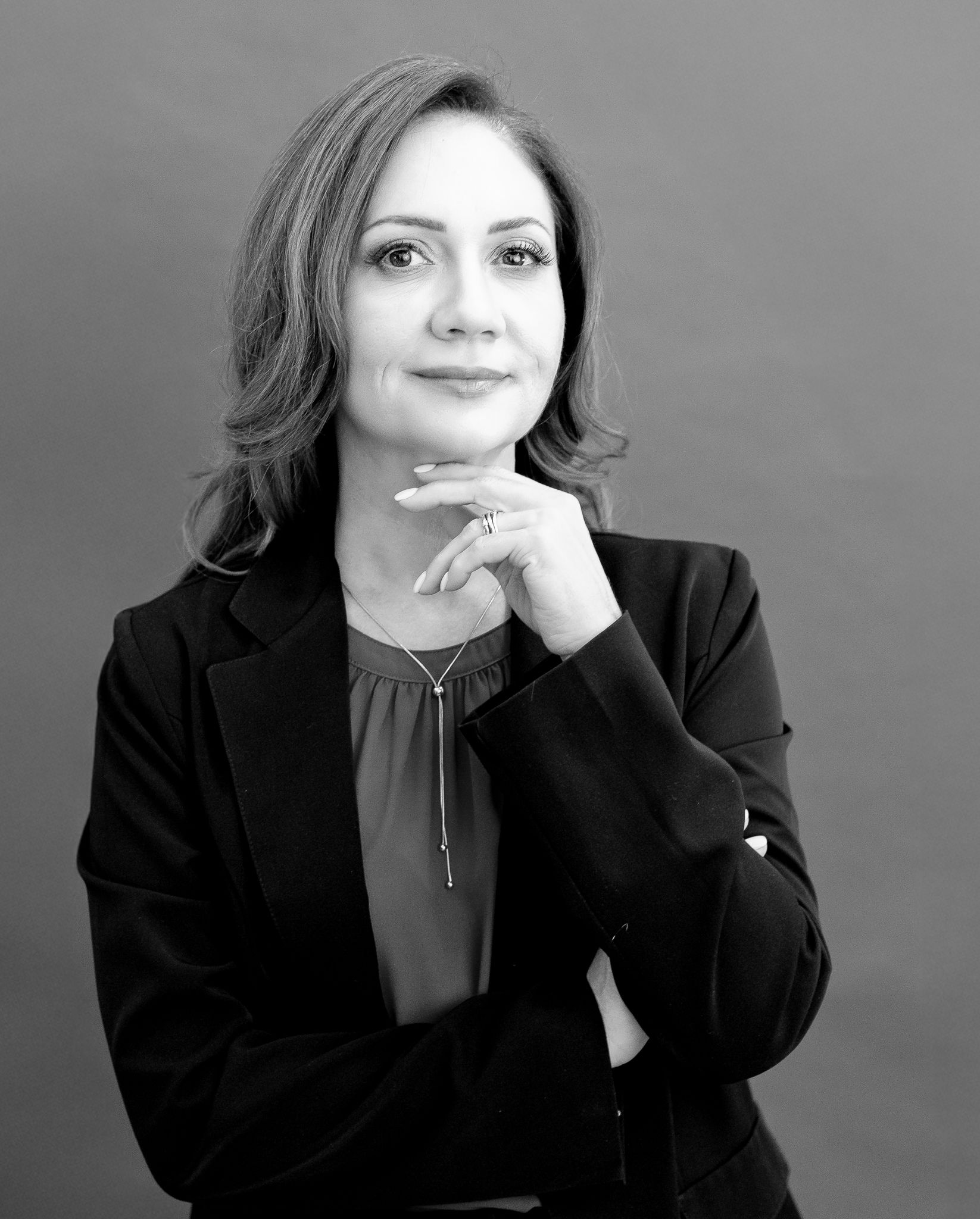 Black and white professional portrait series showing expressive poses.
Personal branding.