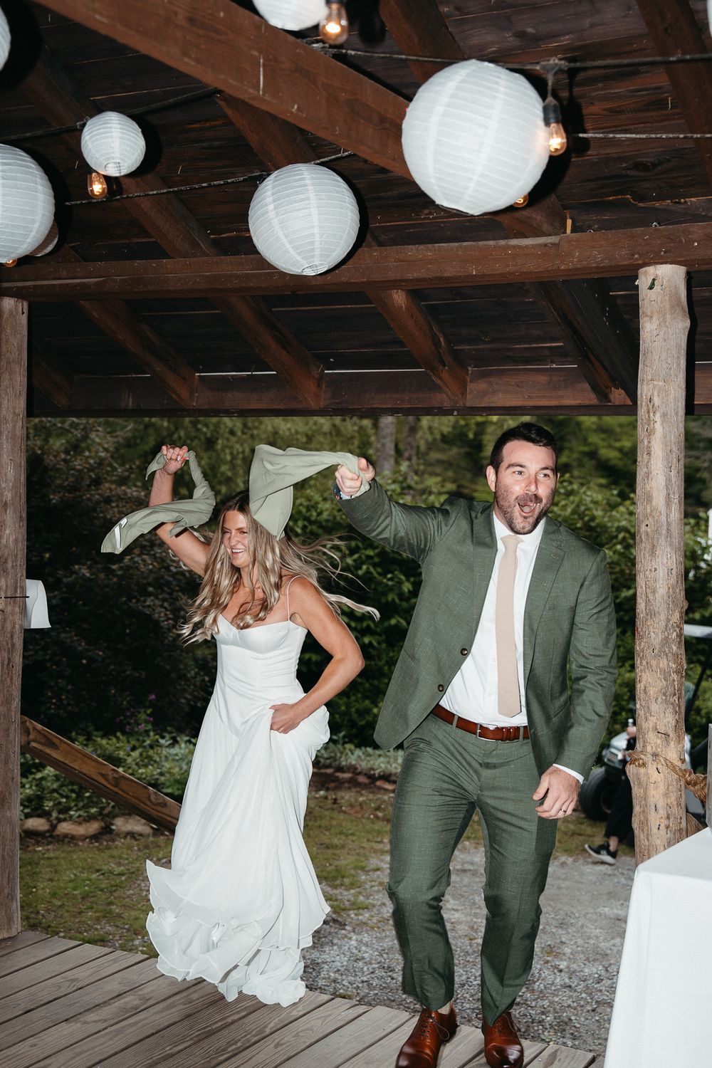 Bride & Groom enter their wedding reception. Hendersonville, NC Camp Pinnacle