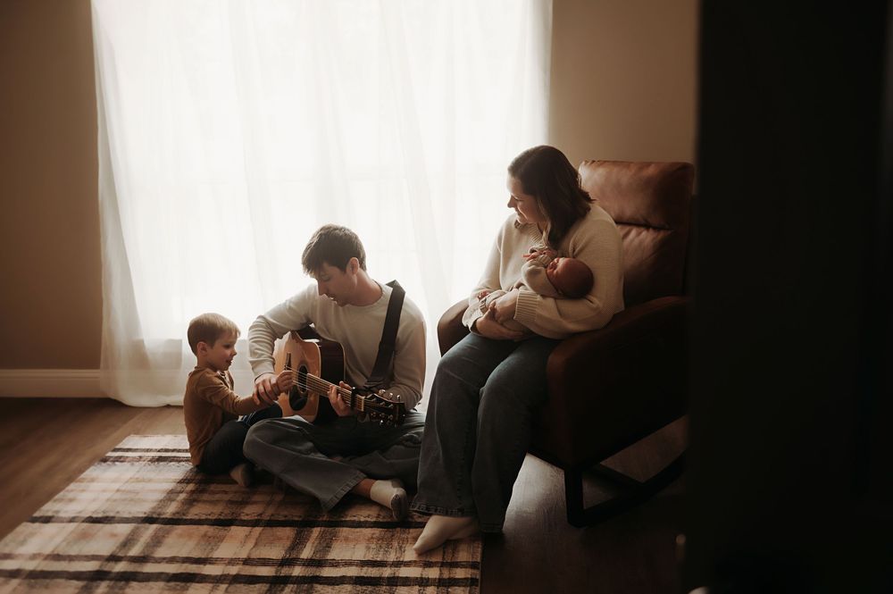 A series of intimate silhouetted photos showing tender moments between two people in warm indoor lighting.