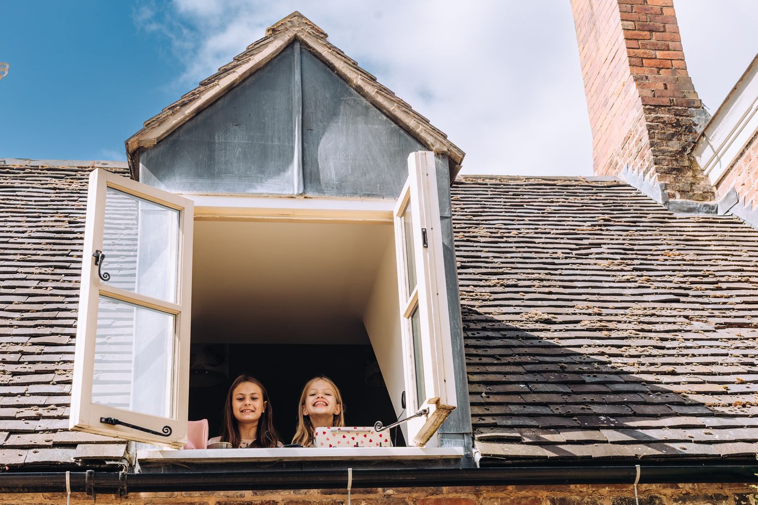 Sequence of five connected images showing a home renovation project transforming a dormer window and roofing area.